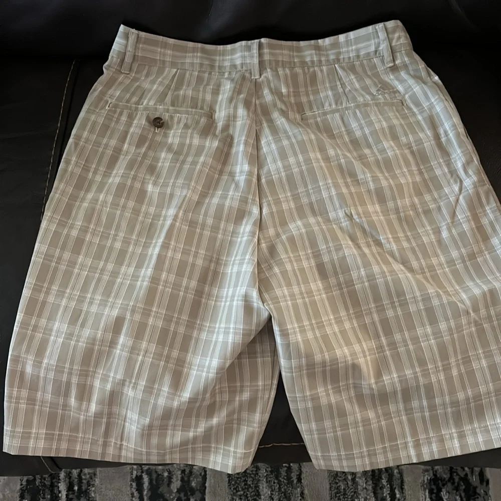 Men’s adidas 32 brown and tan plaid shorts